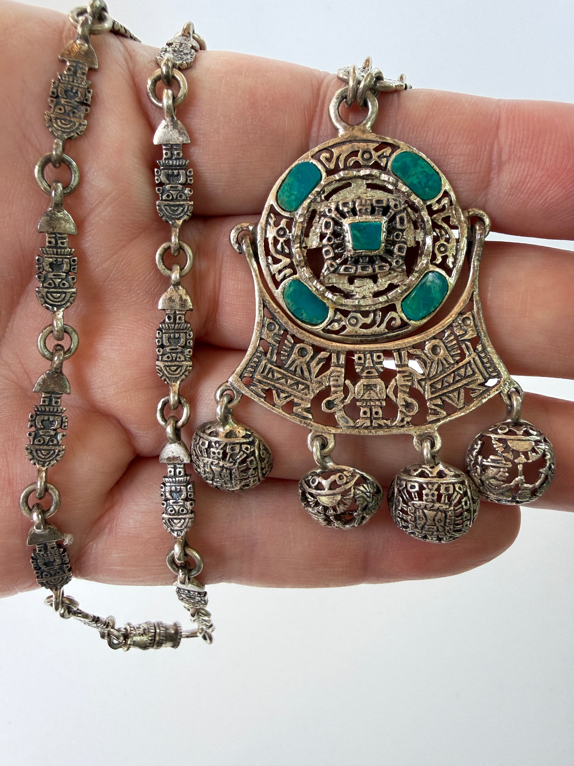 pendant necklace for scale photo