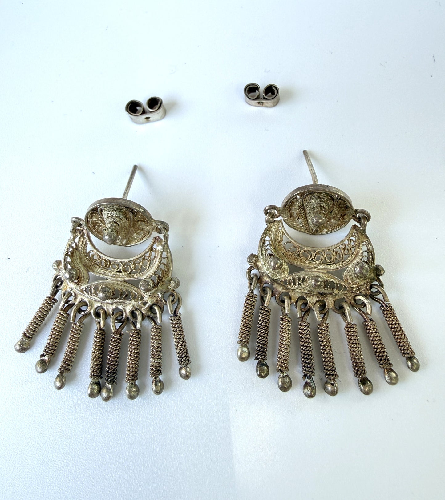 Pair of silver earrings with fringe design